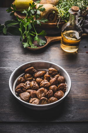Roasted peeled chestnuts in bowl for tasty seasonal cookingの写真素材