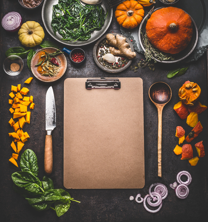 Food background for tasty winter and autumn dishes with pumpkins. Stock photography clipboard for menu or recipes, top view, frame, mock upの写真素材