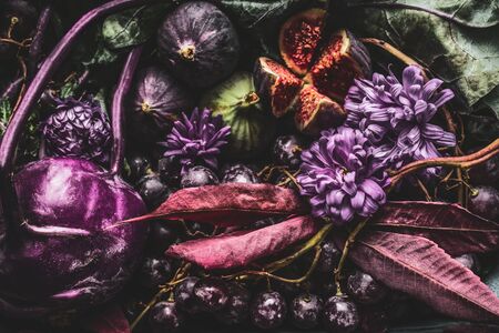 Background of purple food with fruits and vegetables, close upの写真素材