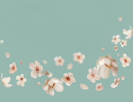 Floral border with flying white cherry blossom blooms at pale blue backgroundの写真素材
