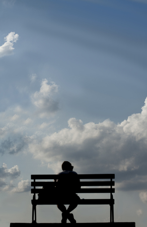 man on a benchの写真素材