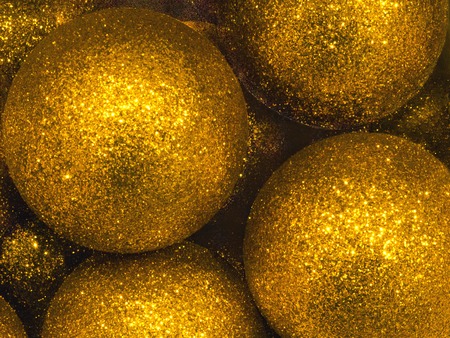 background of christmas balls of shiny greenの写真素材