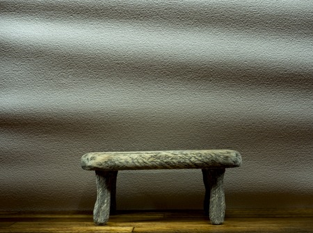 on the background of a gray wavy wooden tableの写真素材