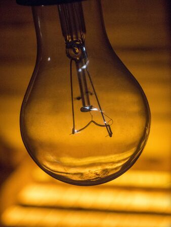 electric lamp on a yellow backgroundの写真素材