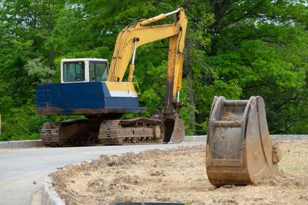 excavator loader machine during earthmoving works outdoors power outdoor
