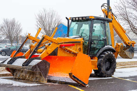 snow plow clears the streets during a snow storm tractor removal