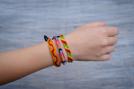 friendship bracelet on the hand people woman child girls