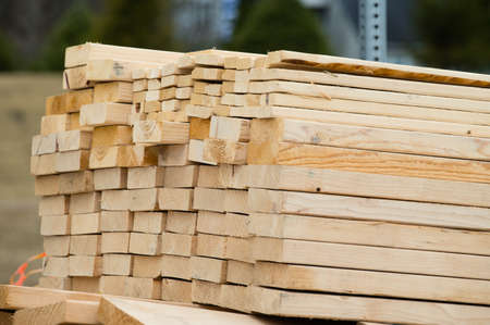 stack of wooden terrace planks at the lumber yard natural planks