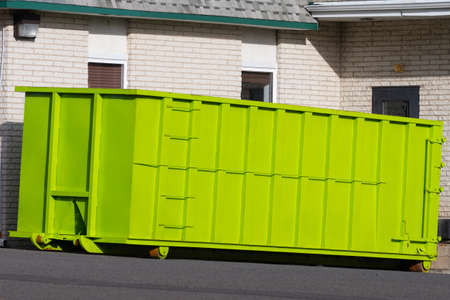 large iron dumpster garbage metal recycle outdoor trashの写真素材