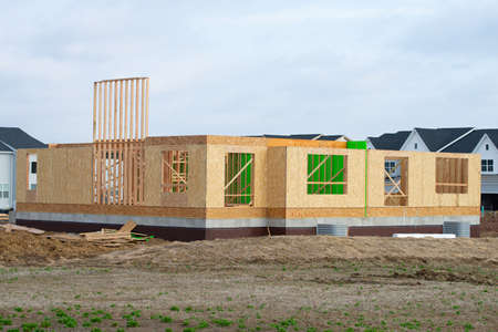 start of construction of a plywood house new framing wall window