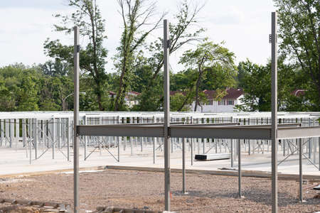 Work site and large steel frame of a large commercial building steel framework