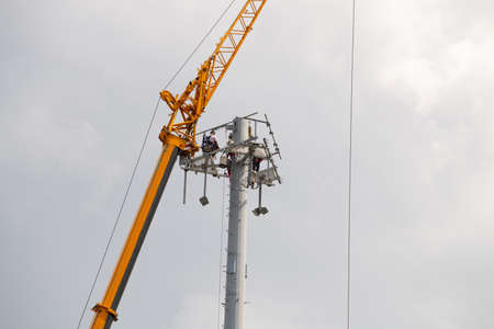 Telecom tower install communication equipment for sent signal to the city, satellite dish telecom...