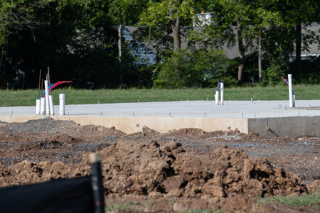 poured concrete foundation for a new house cement steel material metal cornerの写真素材