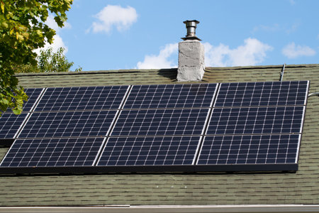 rooftop solar panels against the blue sky energy electric eco new ecological