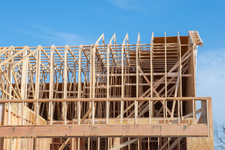 rafters and frame against the blue sky timber roof framework planks top