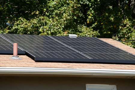 solar photovoltaic panels on a house roof clean new electric