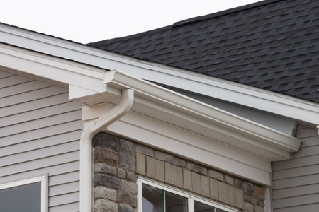 white plastic rain guttering system guttering drainage pipe exterior background of sandwich panel...
