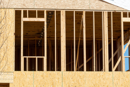 interior frame of new wooden house under construction framework real window building