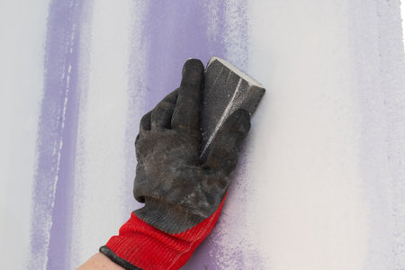 cleaning grout on the wall dlove work workerの写真素材