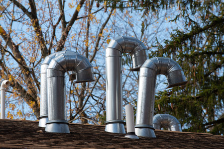 ventilation pipes on the roof metal rooftop smoke