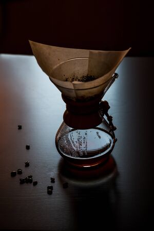 coffee on the table. the light of the sun passes through coffee. coffee beans on the table