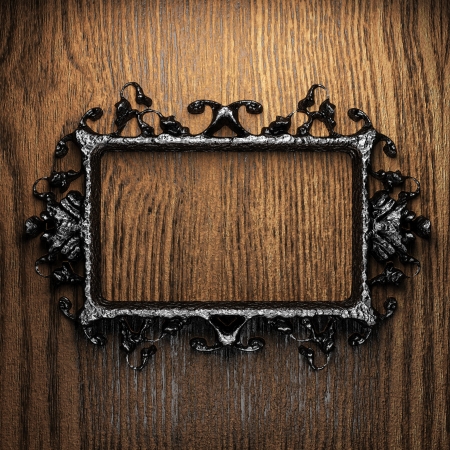 vintage iron frame on the wallの写真素材