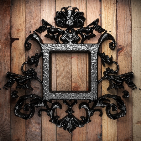 vintage iron frame on the wallの写真素材