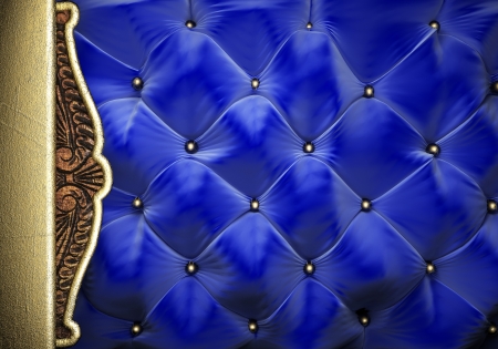 gold on blue fabric backgroundの写真素材