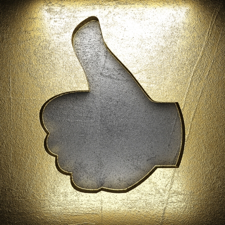 golden sign on steel wallの写真素材