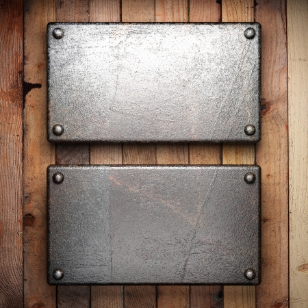 metal on wood backgroundの写真素材