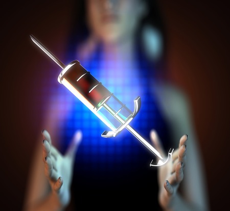 Glass syringe on hologramの写真素材