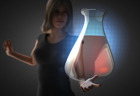 woman and futusistic hologram on handの写真素材