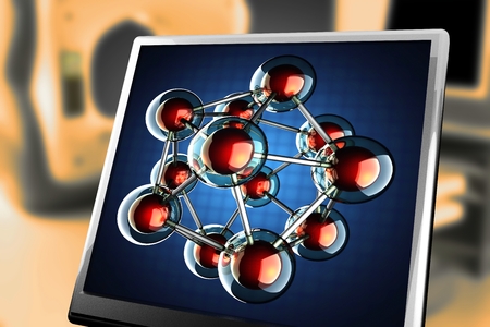 Atom model on blue background at monitorの写真素材