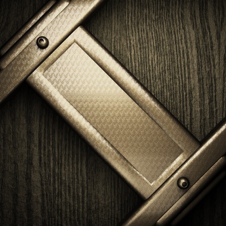 wooden background with metal elementの写真素材