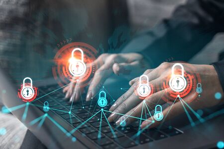 Businesswoman typing laptop and lock drawing. Concept of security of information and business data....
