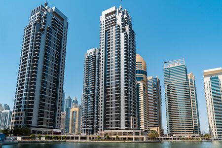 Panoramic view of Dubai skyscrapers in UAE. Dubai Marina prestigious residential area of Dubai close to the sea. Concept of financial success and luxury lifestyle.の写真素材