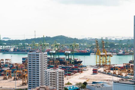 Picturesque panoramic view of Singapore city at day time. Financial and trading center hub in Asia region. Concept of success. Modern buildings in high-tech world.の写真素材