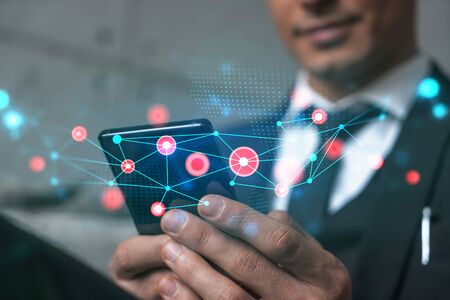 Man in office working with Smartphone, Searching for new tech. Abstract technology hologram, typing...
