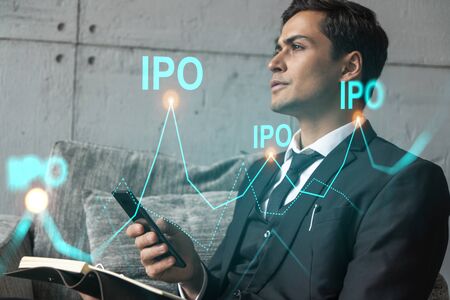 Man in office think and dream datum financial ipo drawing concept. Double exposure.の写真素材