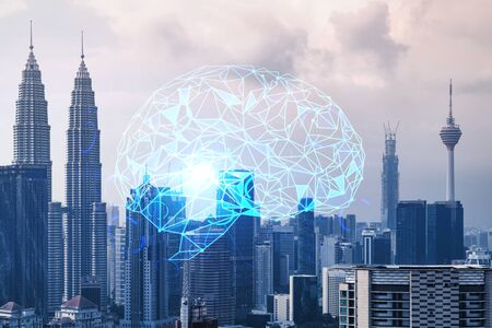 Brain hologram over panorama city view of Kuala Lumpur. KL is the largest science hub in Malaysia, Asia. The concept of developing coding and high-tech science. Double exposure.の写真素材