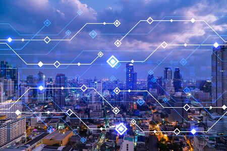 Information flow hologram, night panorama city view of Bangkok. The largest technological center in...