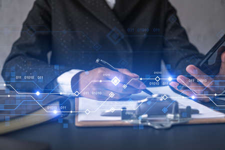 Businesswoman taking notes using smart-phone. Technology drawings double exposure.