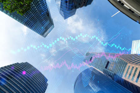 FOREX and stock market chart hologram on low, wide angle view of glass and steel contemporary...