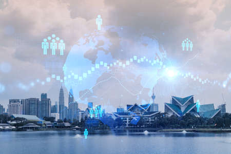 Social media icons hologram over panorama city view of Kuala Lumpur, Malaysia, Asia. The concept of...