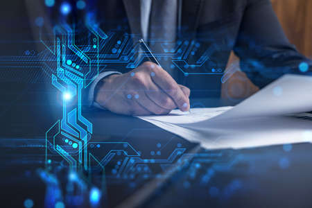 Businessman in suit signs contract. Double exposure with technology illustration hologram. New...