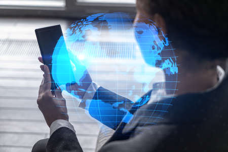 Businesswoman using phone, work in modern office on new project. Double exposure. Concept of...