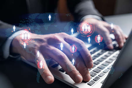 Businessman search for new opportunities, in international business, typing laptop background. World...