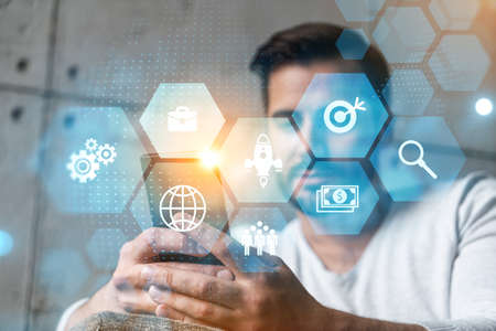 A man typing mobile phone. Double exposure. business research symbol hologram.