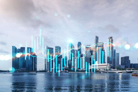 Forex and stock market chart hologram over panorama city view of Singapore, the financial center in Asia. The concept of international trading. Double exposure.の写真素材