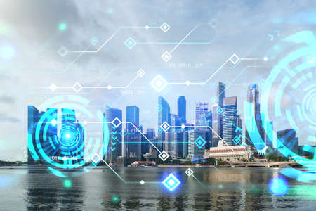 Technology hologram over panorama city view of Singapore. The largest tech hub in Asia. The concept...